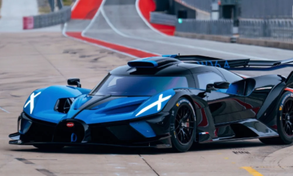 A sleek, blue and black hypercar with futuristic design details