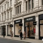 Elegant street with people walking past luxury fashion stores