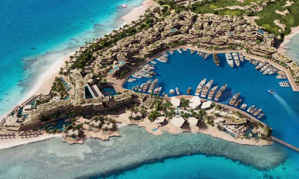 Aerial view of a luxury resort with marina and yachts