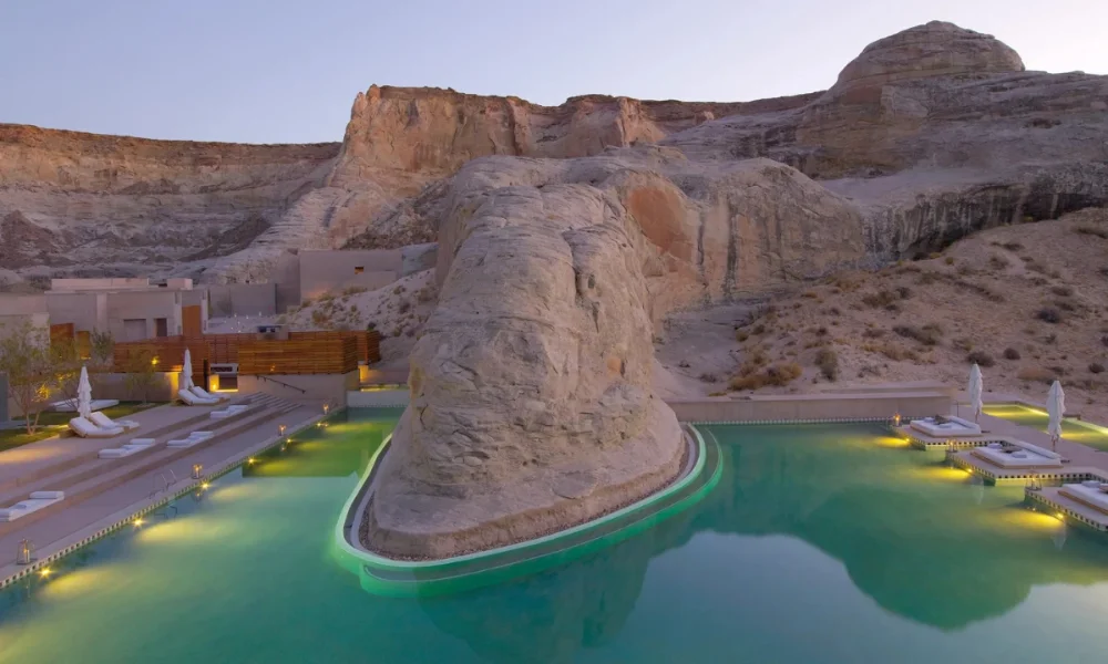 Desert resort pool with rock formations