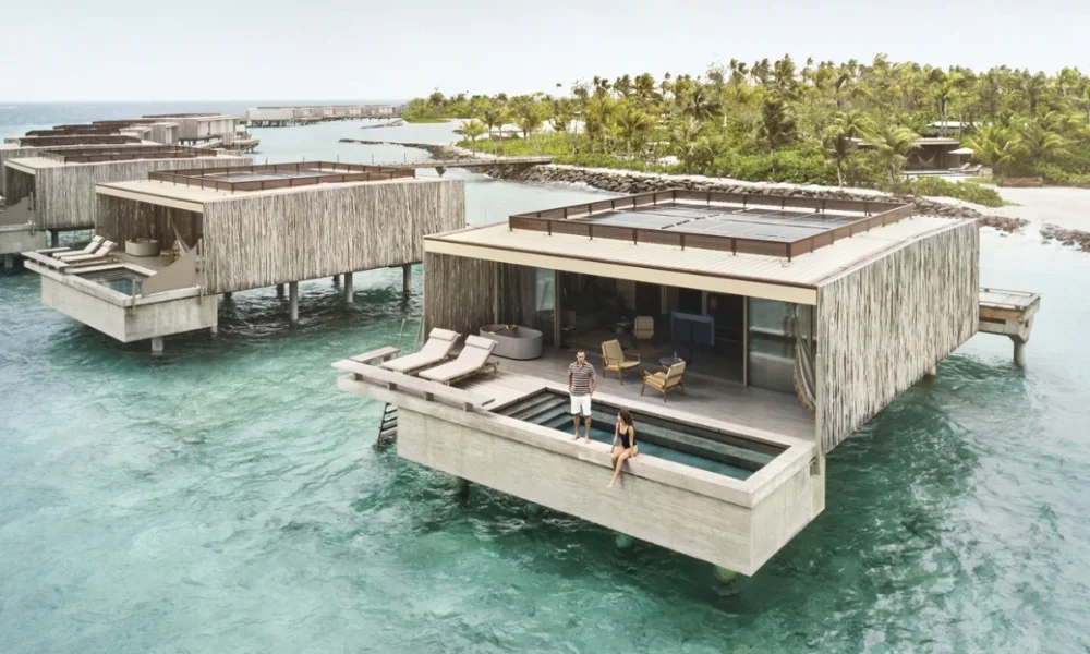 Overwater bungalows with private pools, couple