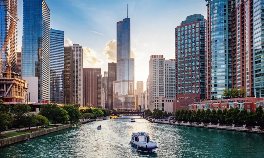 Chicago River with boats and city skyline