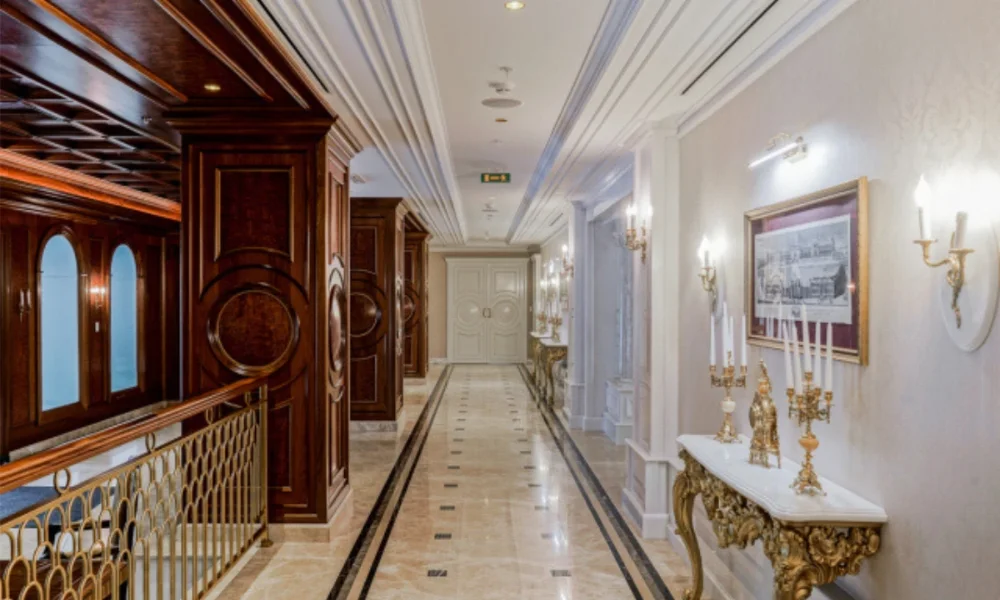 Luxurious hallway with dark wood and marble