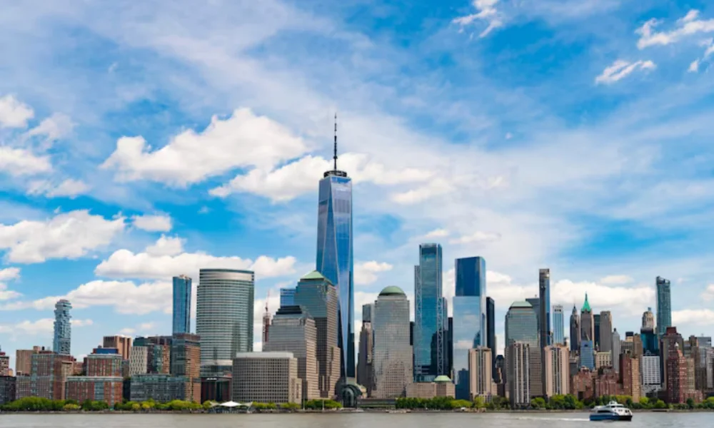New York City skyline, blue sky, white clouds