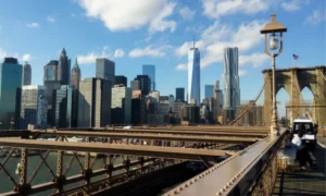 NYC skyline from Brooklyn Bridge on sunny day