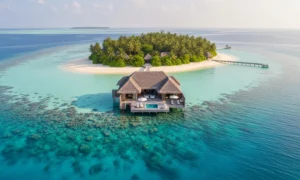 Overwater bungalow, tropical island, coral reef
