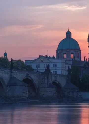 Prague Charles Bridge at sunset, pink sky