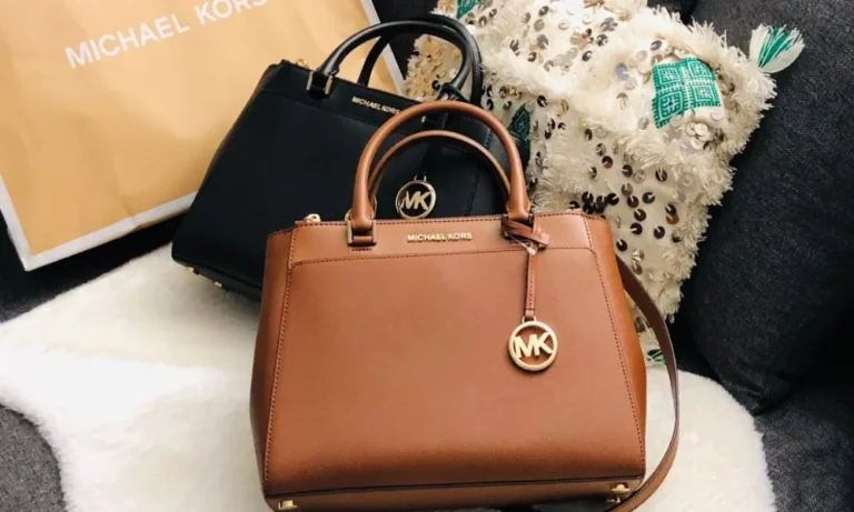 Brown and black Michael Kors handbags