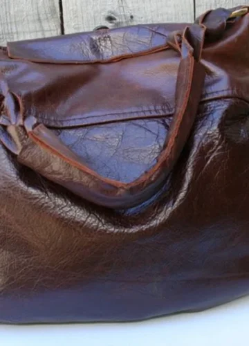 Brown leather handbag with gold hardware