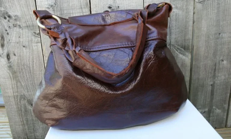 Brown leather handbag with gold hardware