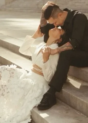 Couple embracing on stone steps
