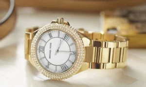 Gold Michael Kors watch with crystal bezel