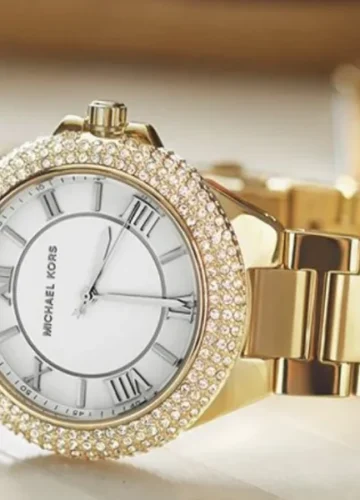 Gold Michael Kors watch with crystal bezel