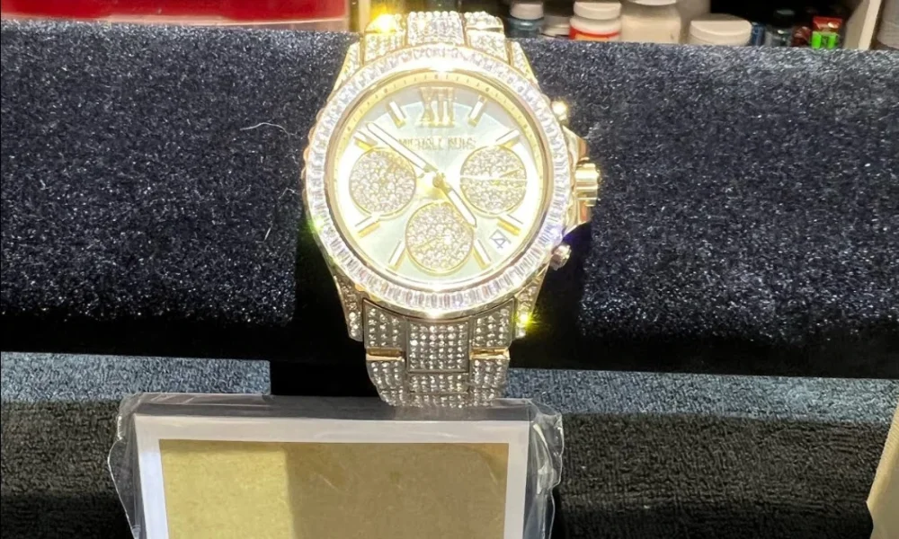 Gold Michael Kors watch with crystal bezel