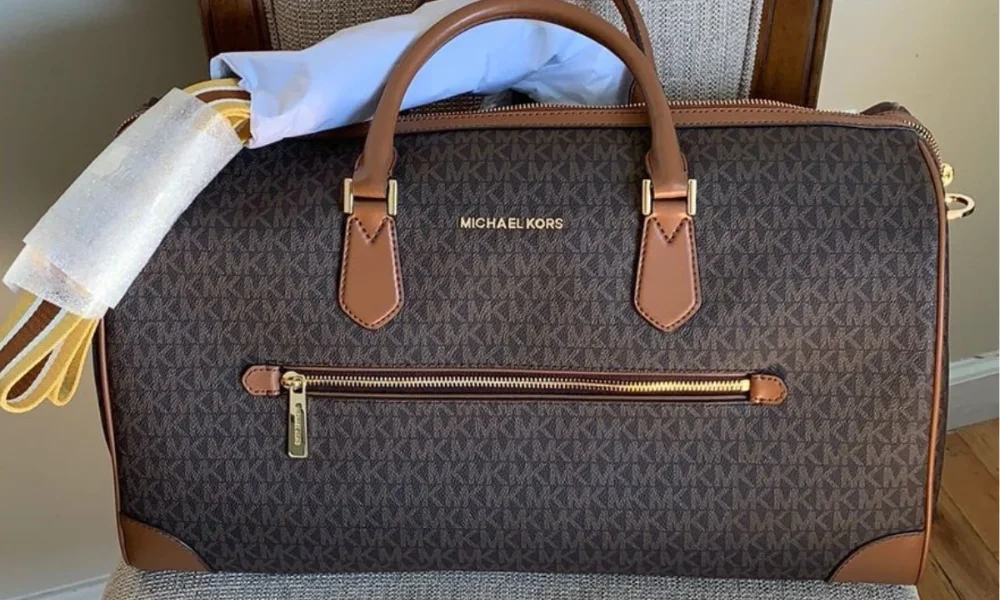 Michael Kors brown monogram duffel bag