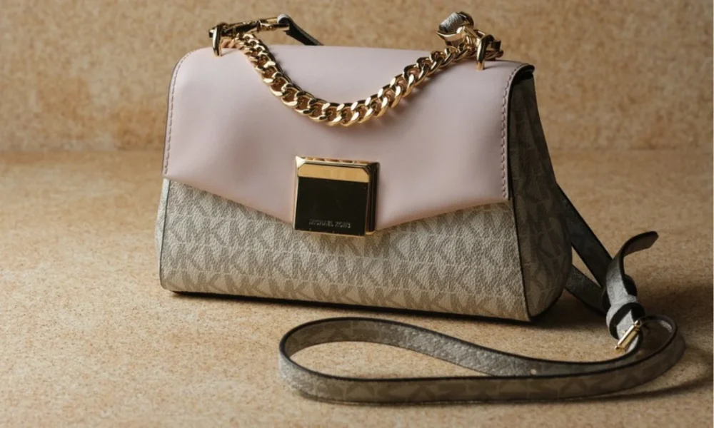 Michael Kors handbag, pink flap, gold chain