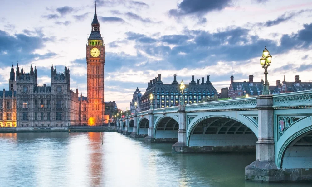 Big Ben, Parliament, and Westminster Bridge at dusk
