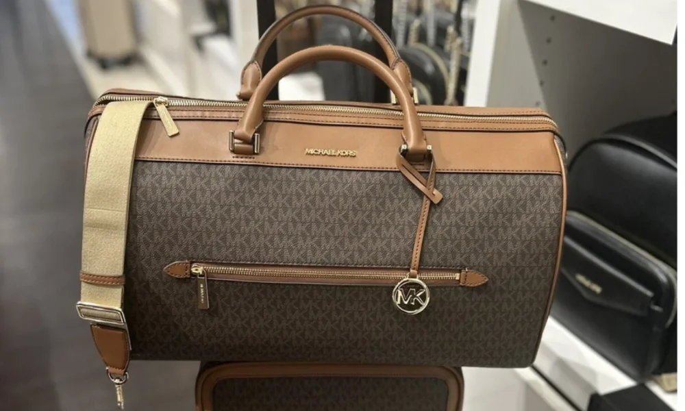 Michael Kors brown monogram duffel bag