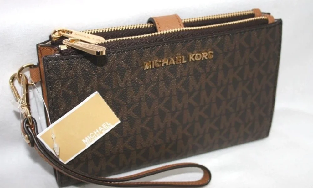 Michael Kors brown monogram wallet with tag