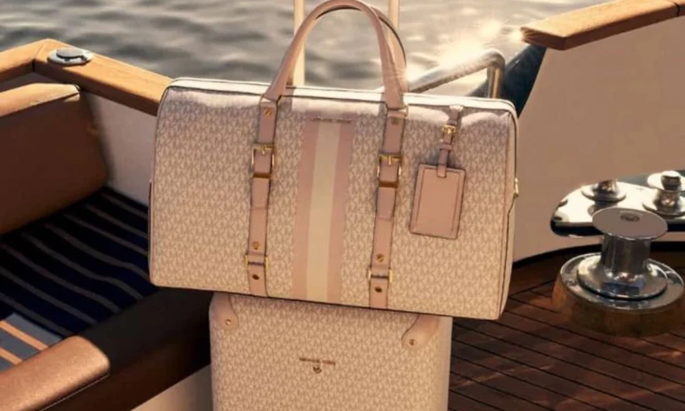 MK monogrammed duffel bag on a yacht