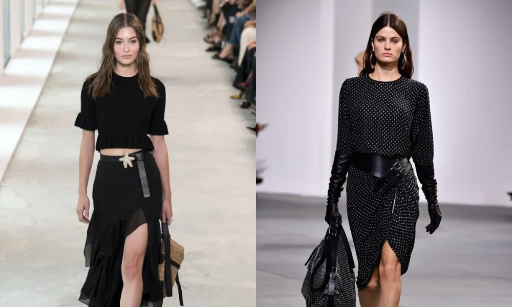 Two models in black outfits on a runway