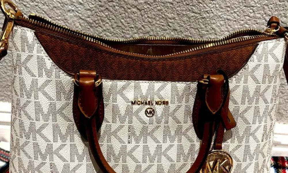 White Michael Kors bag with brown trim