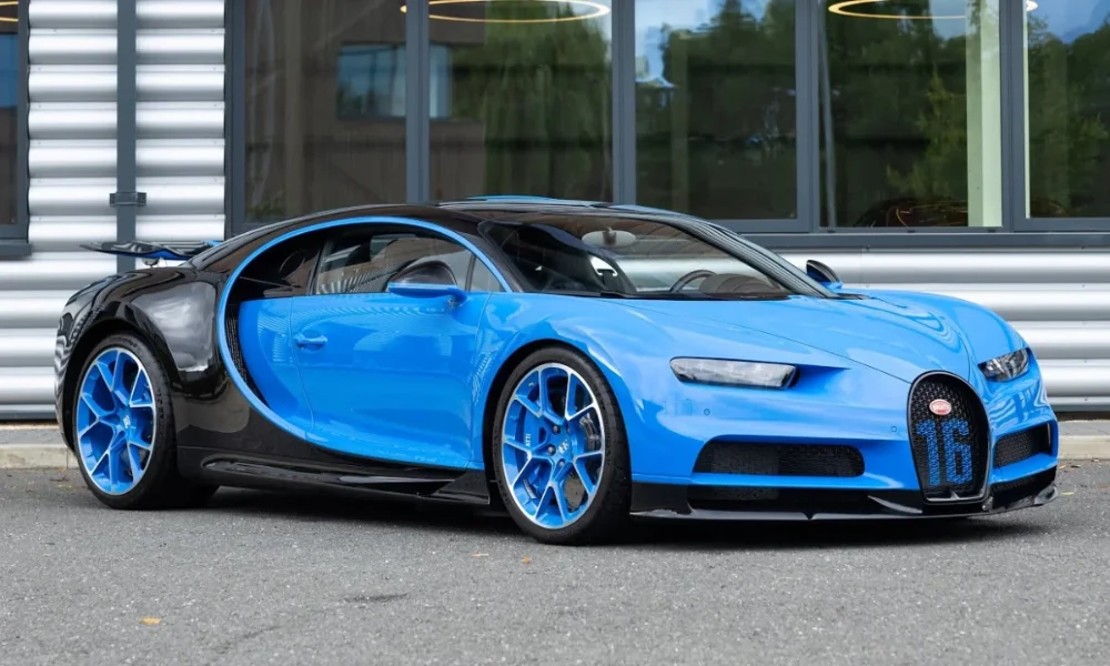 Blue and black Bugatti Chiron parked outdoors