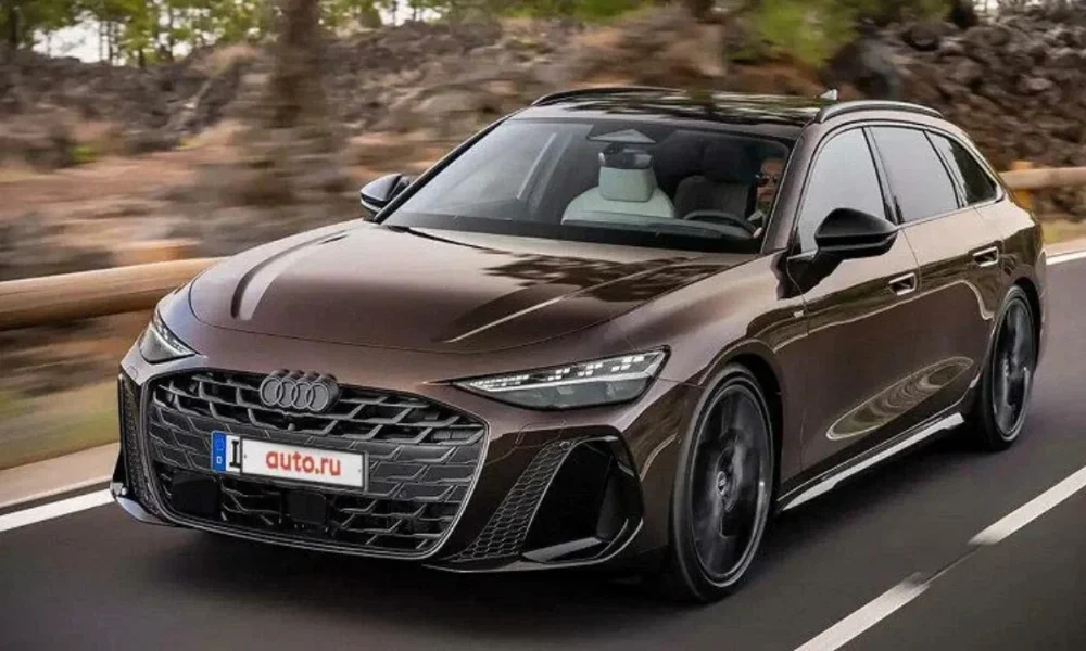 Brown Audi wagon driving on a road