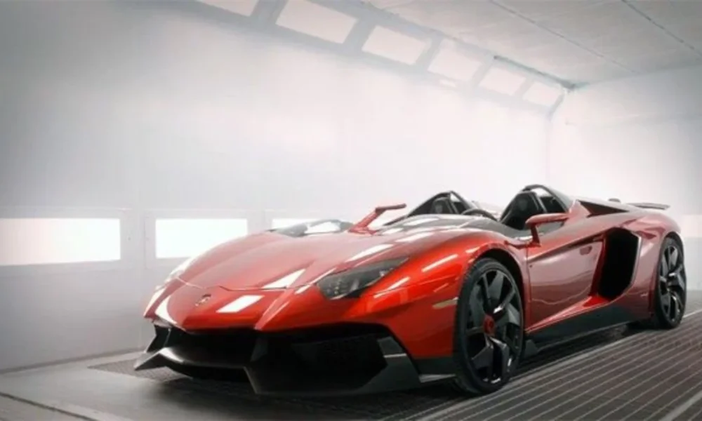 red lamborghini aventador in a white garage
