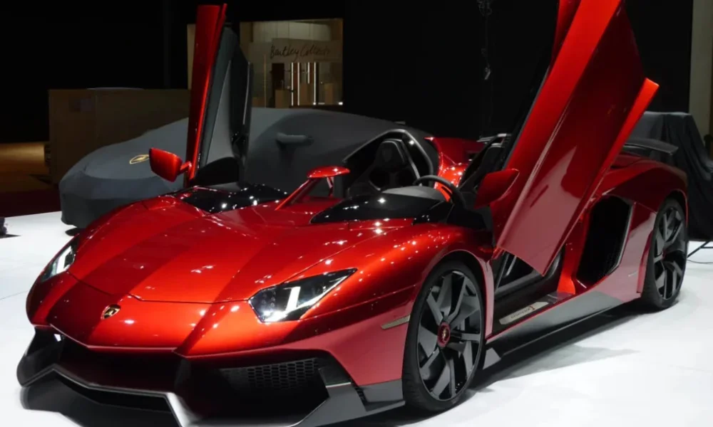red lamborghini with open scissor doors