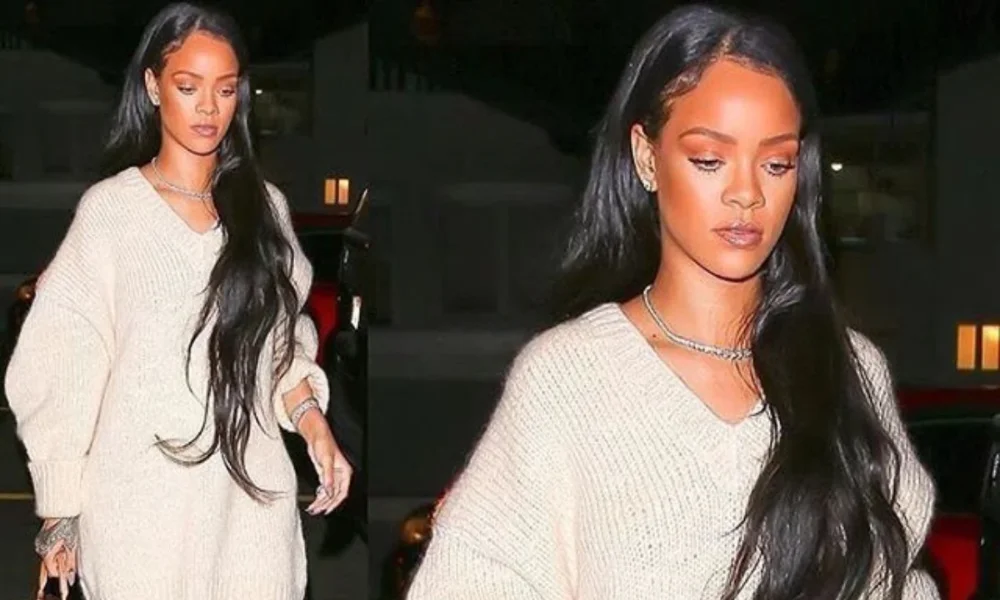 Rihanna in a cream sweater, long dark hair