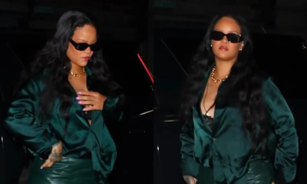 Rihanna in dark green satin shirt and skirt