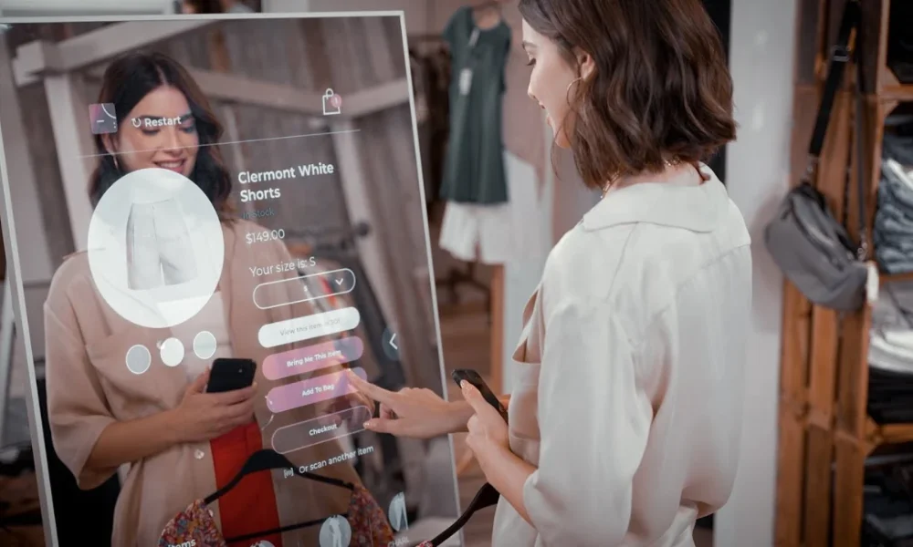 Woman using smart mirror to shop for shorts
