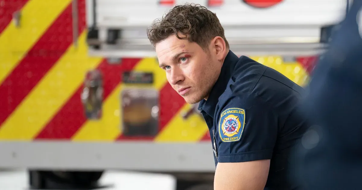 Firefighter working near a rescue vehicle equipment bay