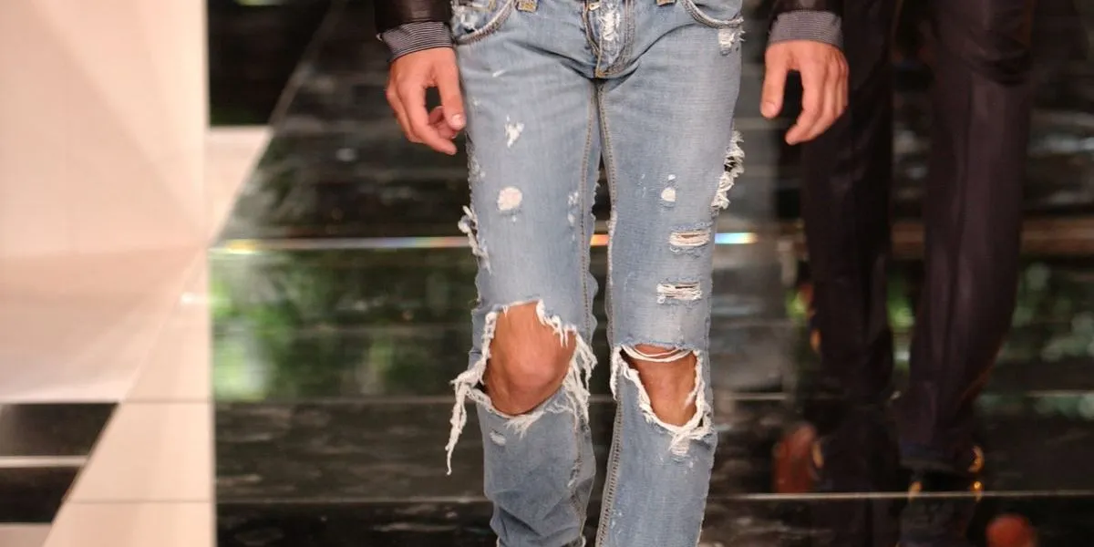 Casual streetwear style featuring distressed denim