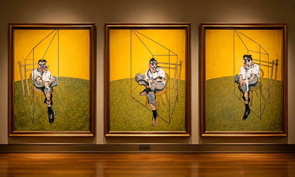 Francis Bacon's triptych Three Studies of Lucian Freud with three yellow panels side by side
