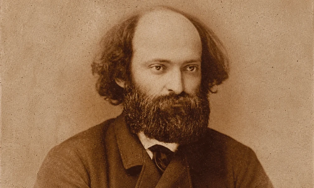 Sepia photo of painter Paul Cézanne (1839–1906), a bridge between Impressionism and modern art, with a full beard and receding hairline