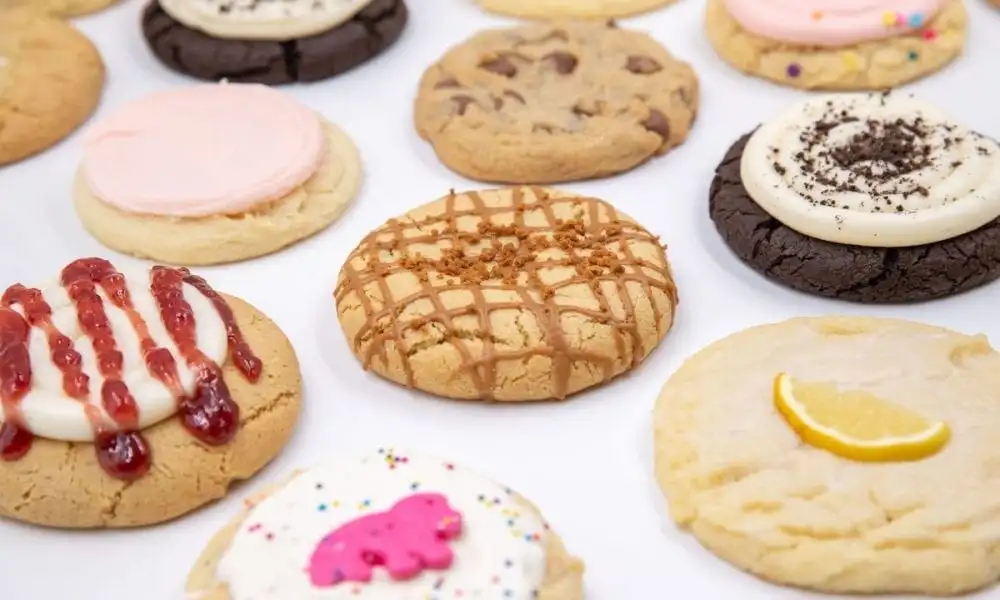 An assortment of oversized decorated cookies on a white surface-Best Chocolate Chip Cookie Recipe 2026