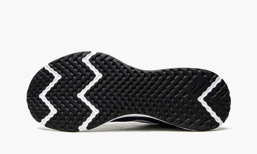 Close-up of a black athletic shoe outsole on a white background-Best Walking Shoes for Women