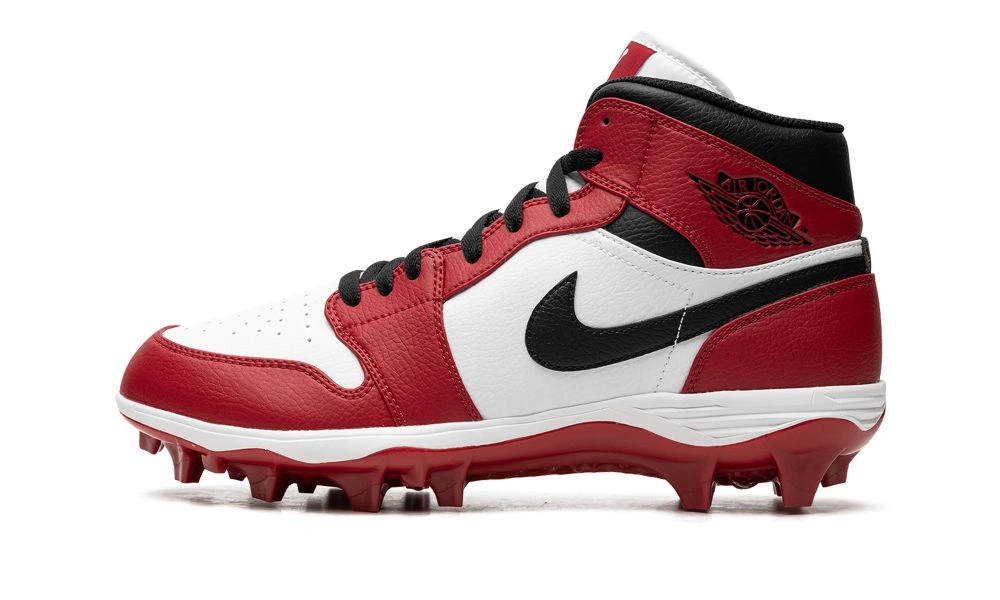 A red, white, and black Nike Air Jordan high-top baseball cleat shown in side profile on a white background, with a bold, athletic style.