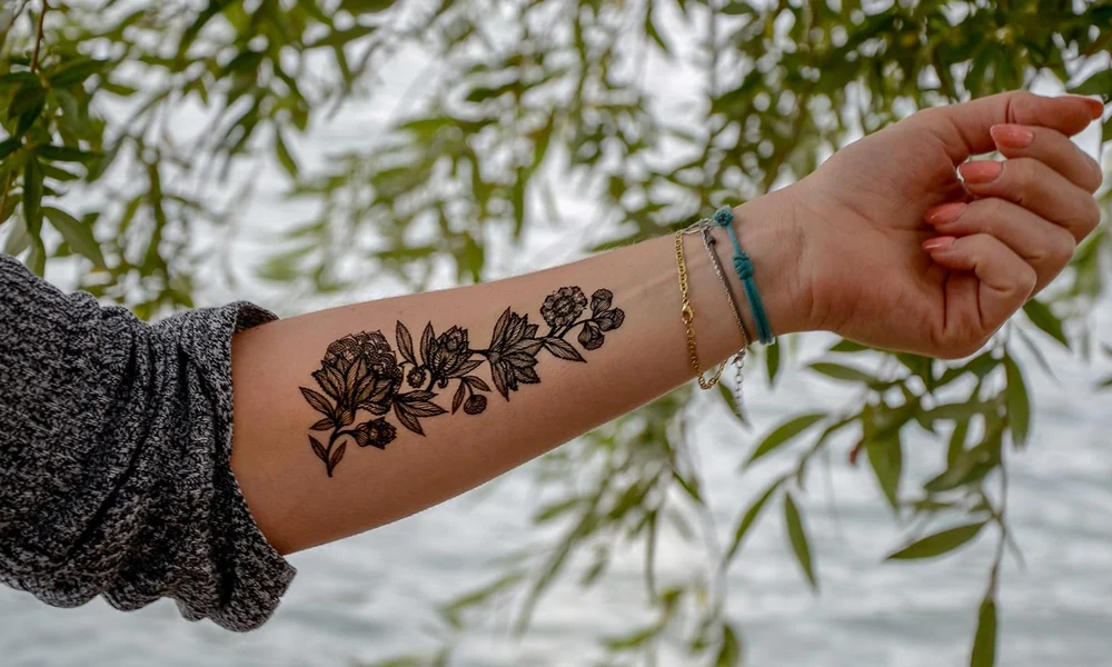 Black Jagua and brown Henna temporary tattoo stains on hands