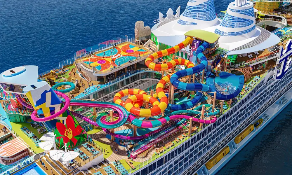 Family enjoying water slides on a large cruise ship