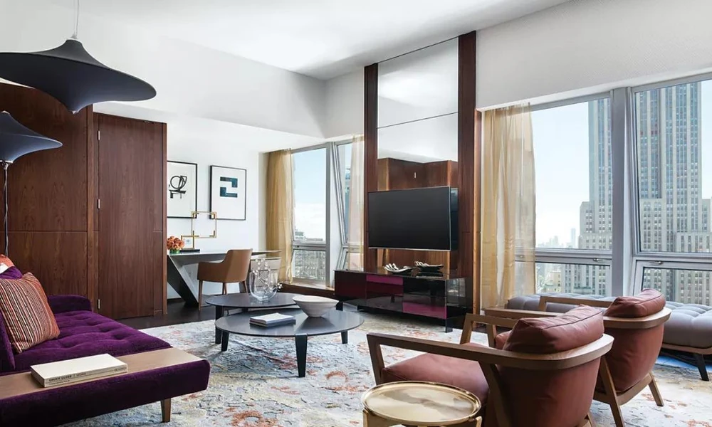 Spacious luxury hotel suite with an elegant sitting area.
