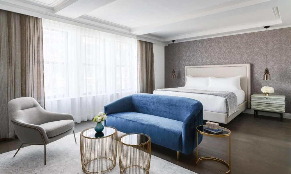 Comfortable boutique hotel room with understated contemporary furnishings.