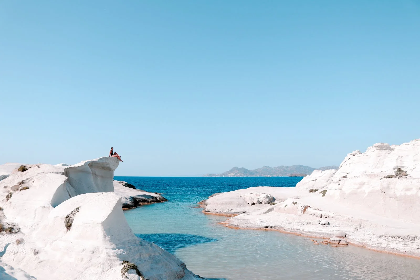 Unique white volcanic rock formations by the sea