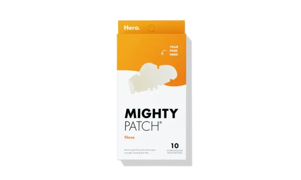 A Mighty Patch Nose box stands against a black background, with bold orange-and-white packaging, nose patch illustration, and a clean, clinical feel.