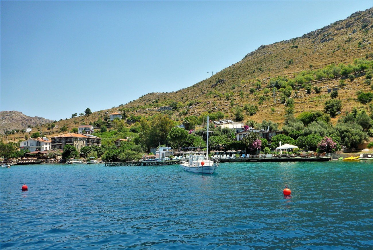 Panoramic view of a scenic coastal town and water