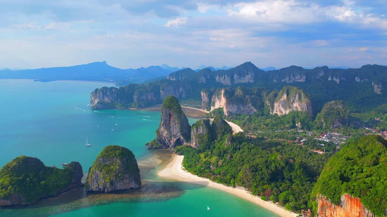 Scenic view of limestone cliffs over blue bay waters