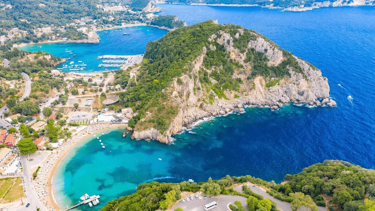 Aerial view of a lush green coastal bay and sea